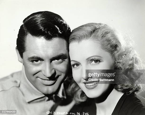 Stars Cary Grant , and Jean Arthur smile for a head and shoulder publicity portrait to advertise "Only Angels Have Wings," directed by Howard Hawks.