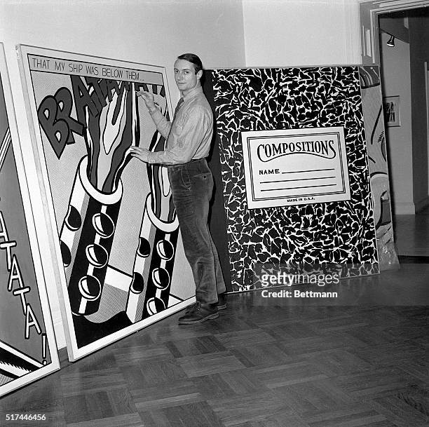 New York, NY- Artist Roy Lichtenstein is shown with a pencil in his hand, as if he is drawing on one of his famous comic-book inspired art works at...