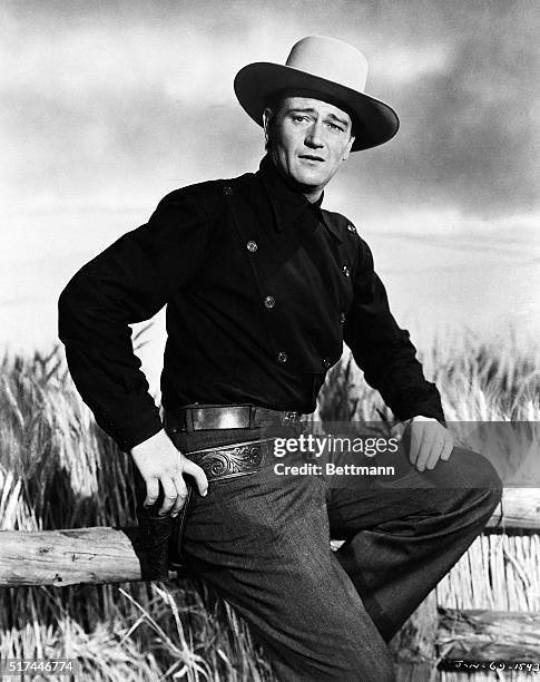 Actor John Wayne in western attire. Undated publicity handout.