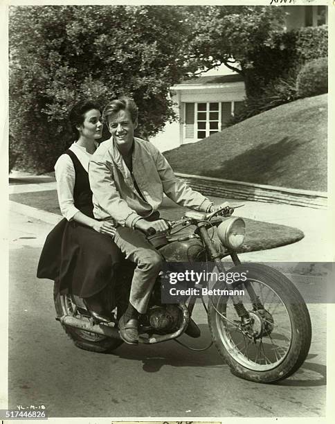 Peter Fonda and Sharon Hugueny share a motorbike in a scene from "The Young Lovers." Undated photograph.