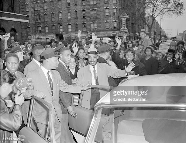 Martin Luther King . Leaving Harlem Hospital with his wife Coretta.
