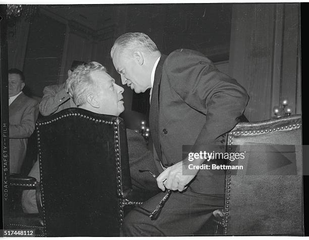 Senators Styles Bridges left, and Everett Dirksen in a head-to-head huddle during a Senate Republican policy conference in the Capitol here today...