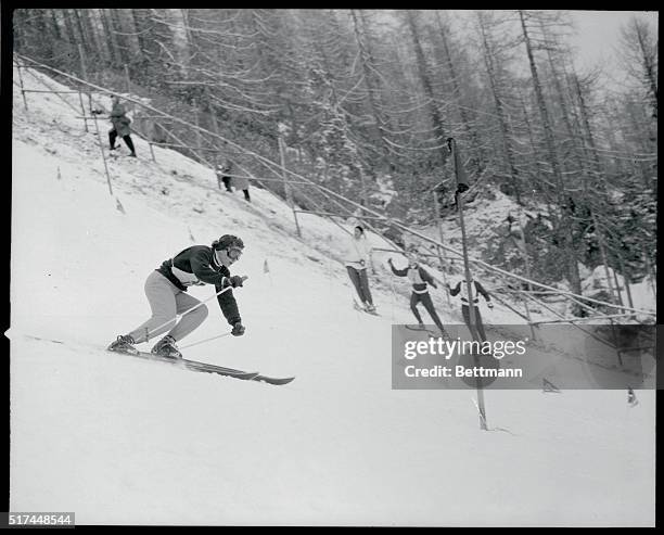 Soviet skier Evgeniya Sidoroba clears a gate during the Women's Olympic slalom. The Russian, the first ever to enter an alpine race contest, placed...