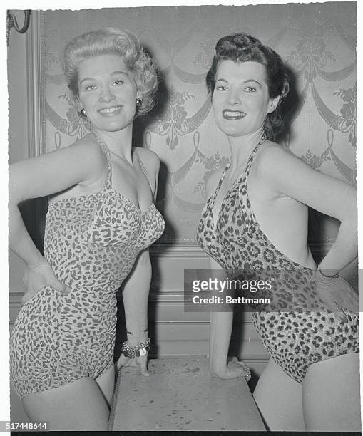 Clad in leopard skin bathing suits, lovelies Marian Moore and Mara McAfee display their feminine talents as they audition or a forthcoming Broadway...