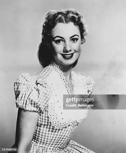 Shirley Jones, Cinderella Star of Rodgers and Hammerstein's Oklahoma!, arrived in New York at Idlewild Airport from Hollywood Friday to sing for New...