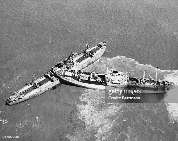 The sharp prow of the Swedish ship SS Nyland almost cuts the Liberty ship E. Kirby Smith in two after they collided near Norfolk. The Nyland plowed...