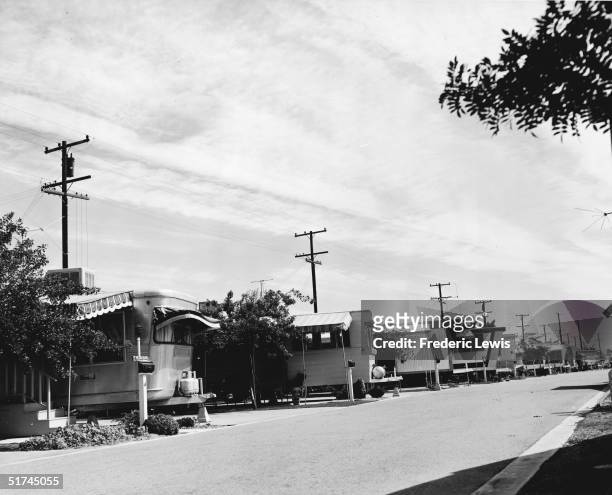 View down a street in a trailer court, Malibu, California, 1950s.