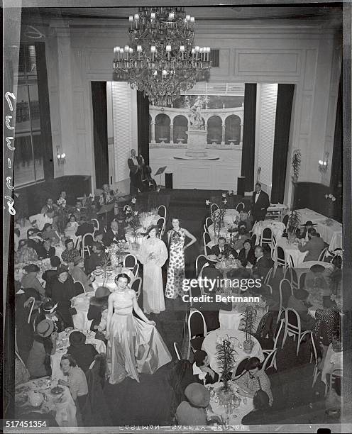 Papa, natural and sugar, was given the opportunity of looking over some of the new modes of the evening, during the cocktail hour today at the...