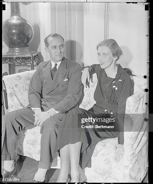 Mr. And Mrs. John Boettiger, she is the former Anna Roosevelt Dall, daughter of President Roosevelt, were photographed here today at the Roosevelt...