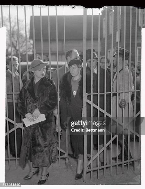 Mrs. Bruno Hauptmann, whose husband Bruno Richard Hauptmann is on trial for murder of the Lindbergh baby, is shown arriving at the Hunterdon County...