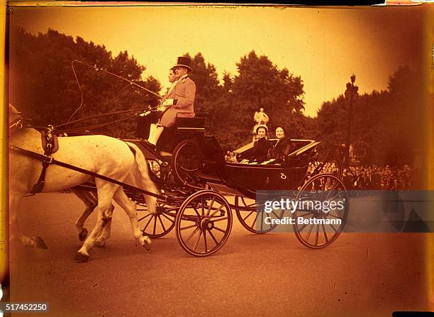 Queen Mother Elizabeth and Princess Margaret are shown here on their way to the Horse Guards Parade for the trooping of colors.