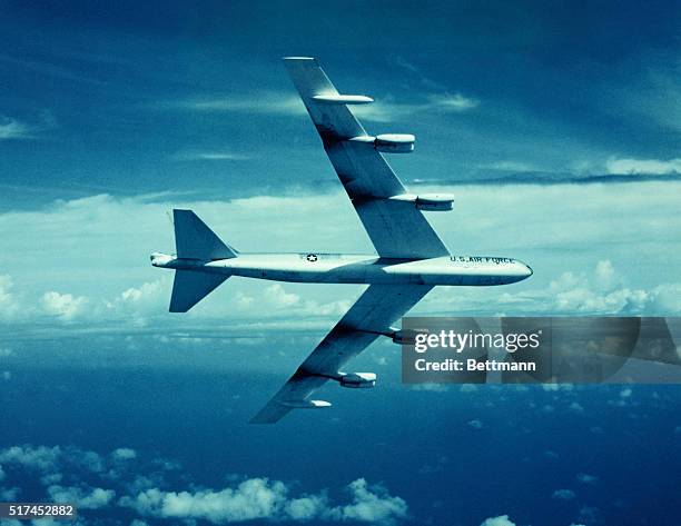 The Boeing B-52 Stratofortress which dropped the "Cherokee" thermonuclear device during Operation REDWING, is shown here over the Pacific Proving...