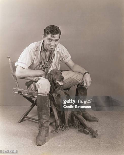 Star and His Best Pal. Clark Gable and his Irish setter hunting dog "Queen" who is his constant companion at the Metro-Goldwyn Mayer studios where he...