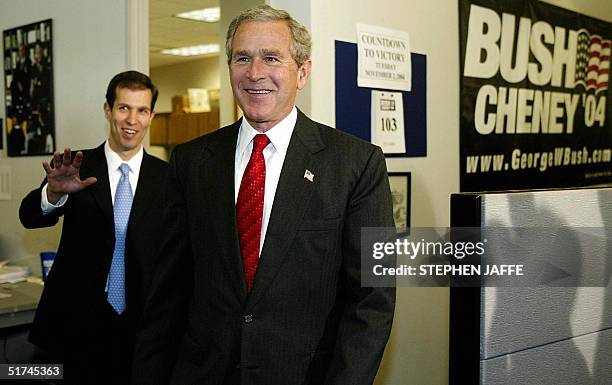 This 21 July 2004 file photo shows US President George W. Bush receiving a tour of the Bush-Cheney Campaign Headquarters from campaign manager Ken...