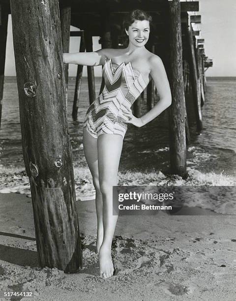 Jupiter's Darling. Styled for sun, sand and a star are these new models worn by MGM star Esther Williams. Miss Williams is currently starring in...