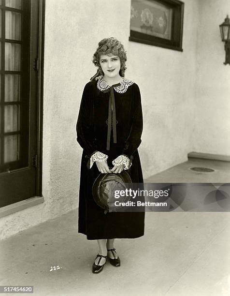 Mary Pickford is shown wearing a dress made by Jeanne Lanvin of Paris.