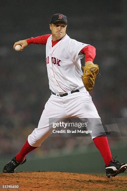 Pitcher Mike Timlin of the Boston Red Sox pitches during game two of the 2004 World Series against the St. Louis Cardinals at Fenway Park on October...