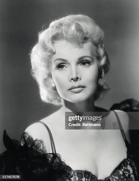 Glamorous Zsa Zsa Gabor plays a dual role, twin sister, in Universal-International's The Girl in the Kremlin, dramatic story of intrigue and suspense...