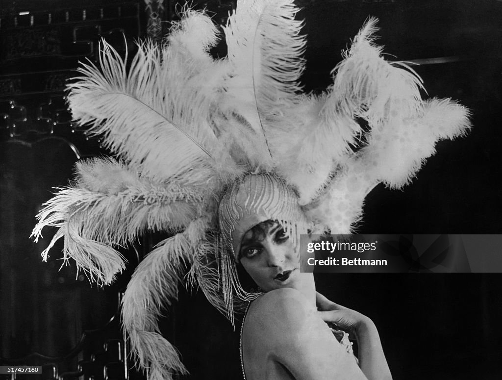 Woman Wearing Feather Headdress