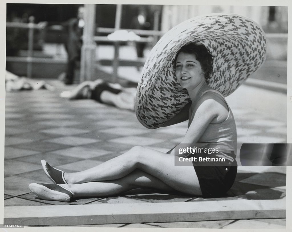 Dorothy Sebastian Wearing Wide Straw Hat