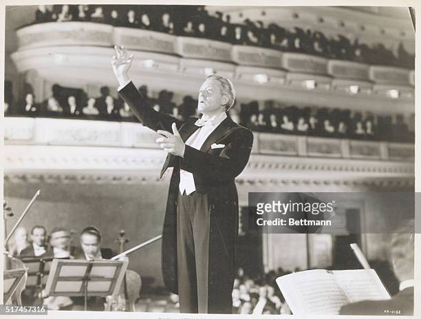 Conductor Artur Rodzinski is appearing here in the 1947 United Artists film, Carnegie Hall. The film was directed by Edgar Ulmer.