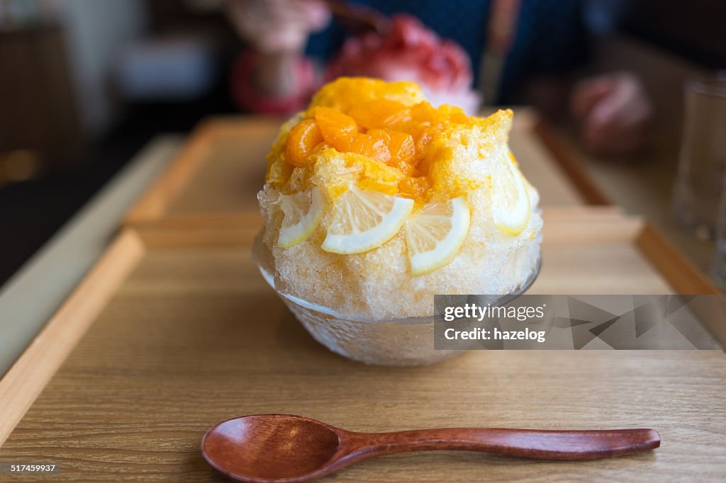 Shaved ice topped with mixed citrus