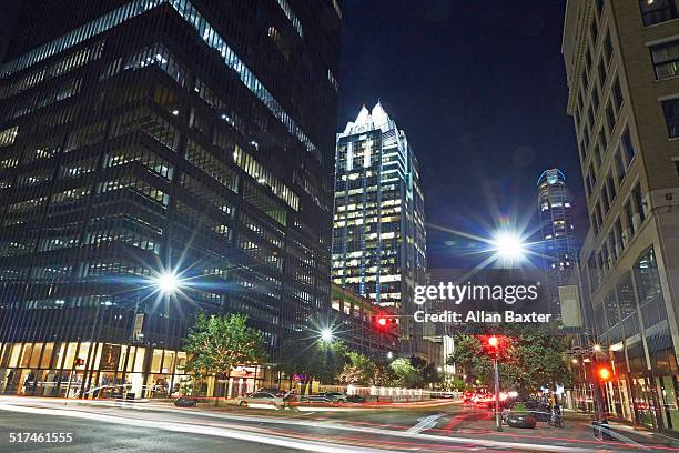 street in downtown austin at night - austin nightlife stock pictures, royalty-free photos & images