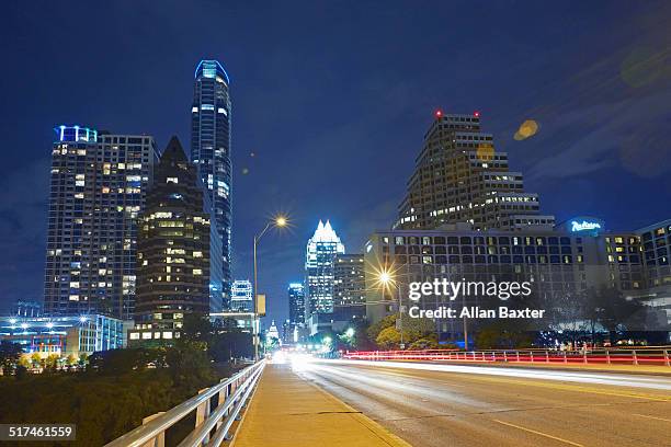 cityscape of downtown austin at night - austin nightlife stock pictures, royalty-free photos & images