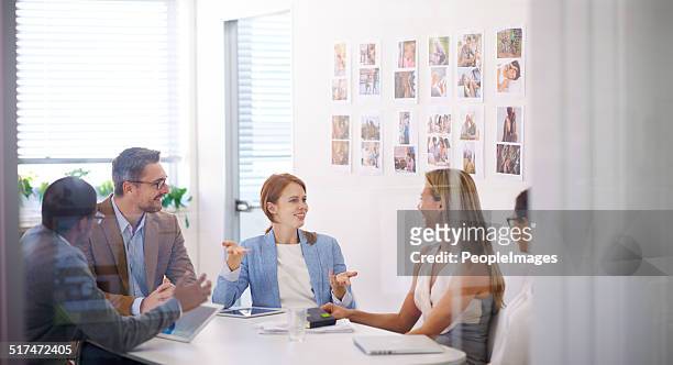 the a team hard at work - peopleimages stock pictures, royalty-free photos & images