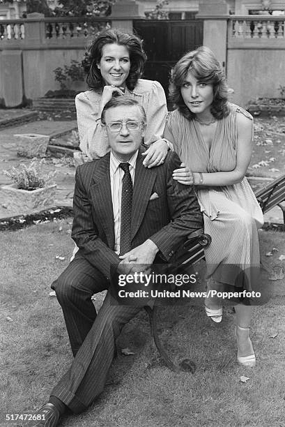 English actor Edward Woodward pictured with actresses Hilary Tindall and Amanda Kemp who all appear in the television comedy series Nice Work, posed...