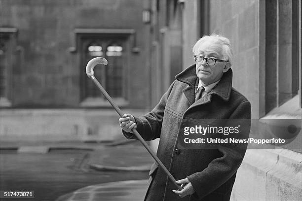 British Labour Party politician and Leader of the Opposition, Michael Foot pictured with a walking stick in London on 10th March 1982.