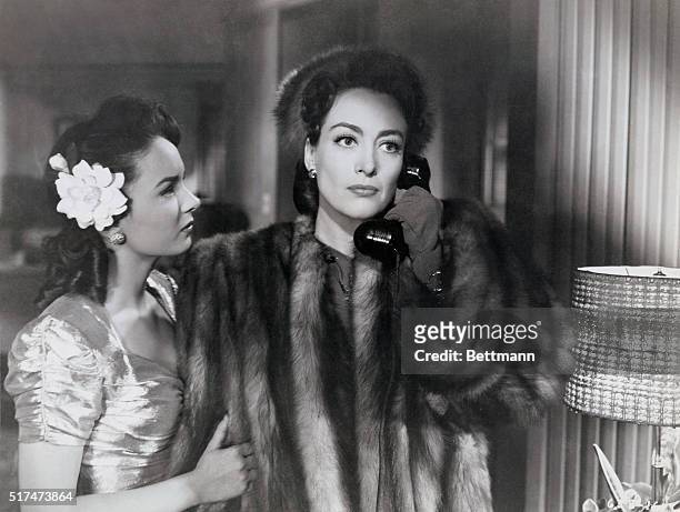 Ann Blyth and Joan Crawford star in the Warner Brothers' drama, Mildred Pierce which was directed by Michael Curtiz.