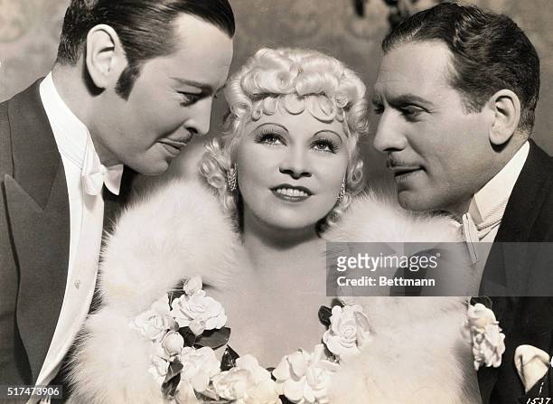Ivan Lebedeff , Mae West and Paul Cavanagh in the Paramount picture, Goin' to Town.