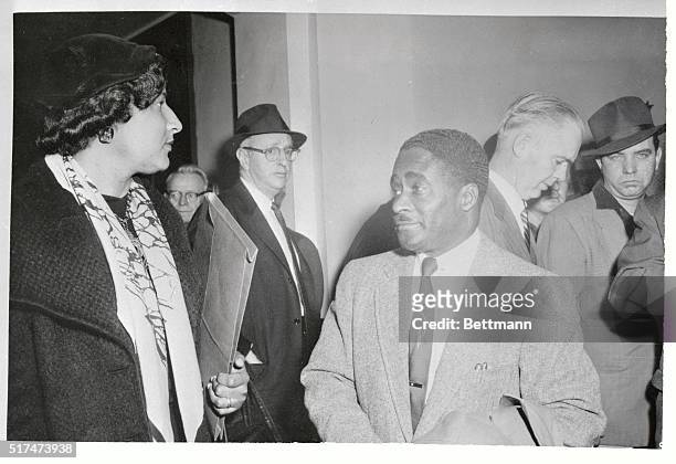 Attorneys Arthur Shores and Mrs. Constance Motley of New York, from the National Association for the Advancement of Colored People, leave Federal...