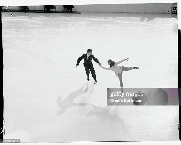 Austria's Elizabeth Schwartz and Kurt Oppelt make an impressive show of the talents, during the Olympic pair skating event. The Austrian couple won...
