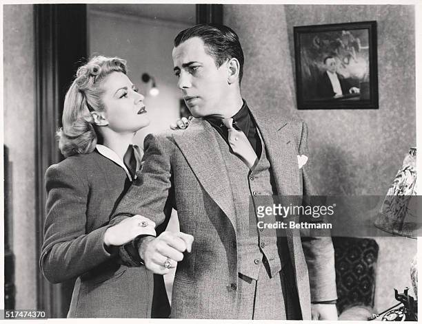 Claire Trevor and Humphrey Bogart in a scene from AAP's Warner Bros. Drama The Amazing Dr. Clitterhouse.