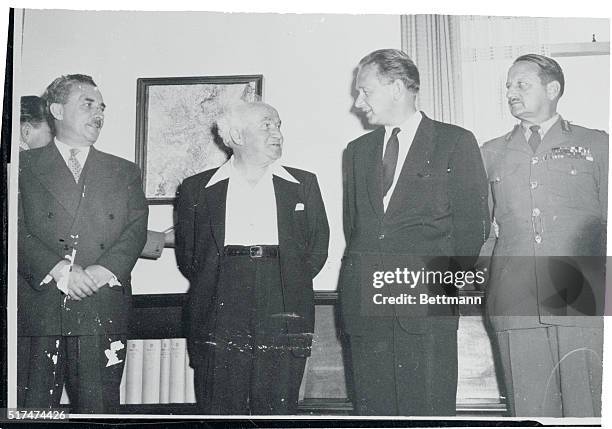 On his peace mission to the Middle East, United Nations Secretary General Dag Hammarskjold chats with Israeli Prime Minister David Ben-Gurion, while...