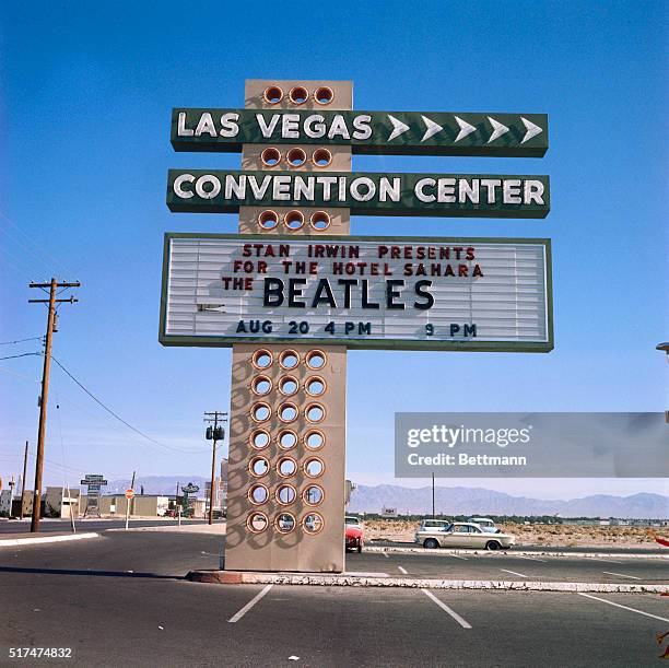 Las Vegas Convention Center's billboard advertising two performances by English rock 'n' roll sensations the Beatles. The concerts are scheduled for...