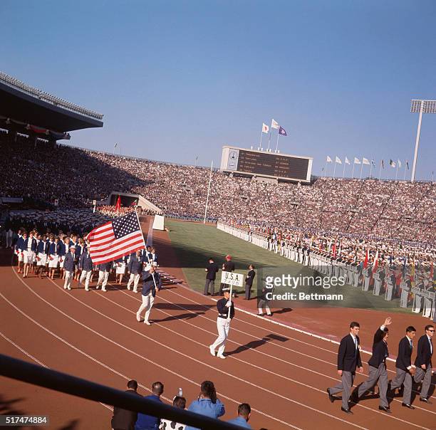 Team marches onto the field during opening ceremonies of the 1964 Olympiad. Tokyo, Japan.