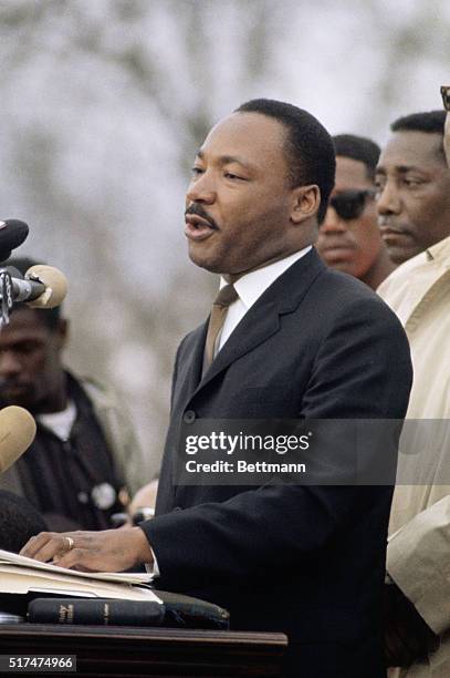 Civil rights leader Dr. Martin Luther King at the podium giving a speech in Montgomery, Alabama, after the Selma to Montgomery Civil Rights March.