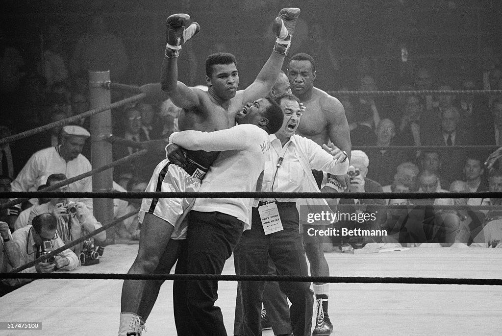 Boxer Muhammad Ali Defeating Sonny Liston