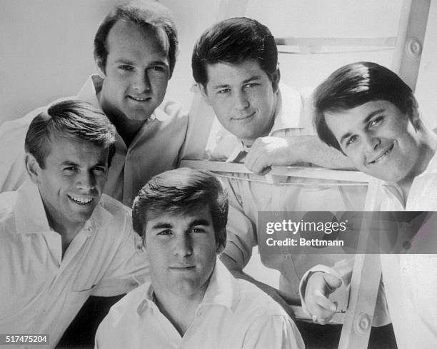 Clockwise from left, the Beach Boys are Al Jardine, Mike Love, Brian Wilson, Dennis Wilson, and Carl Wilson.