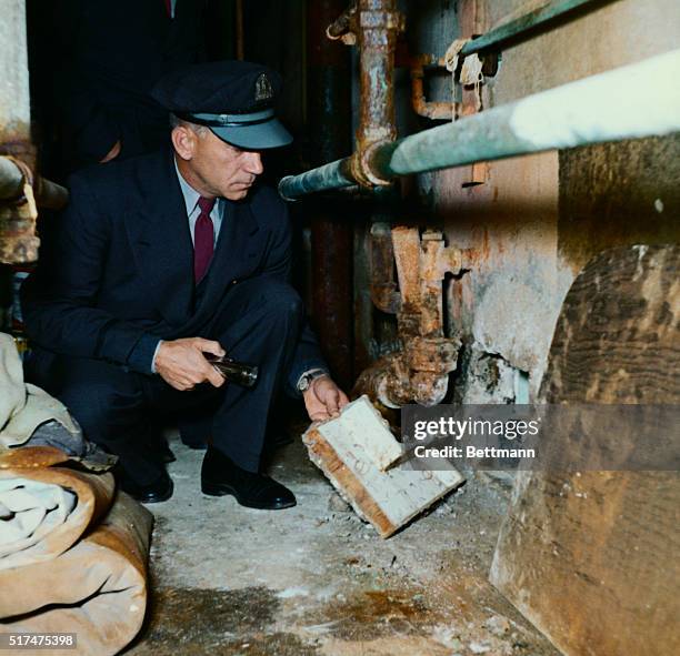 Here is one of the cells in Cell Block B in Alcatraz Prison in San Francisco Bay from which three prisoners escaped 6/12. Here is an officer showing...