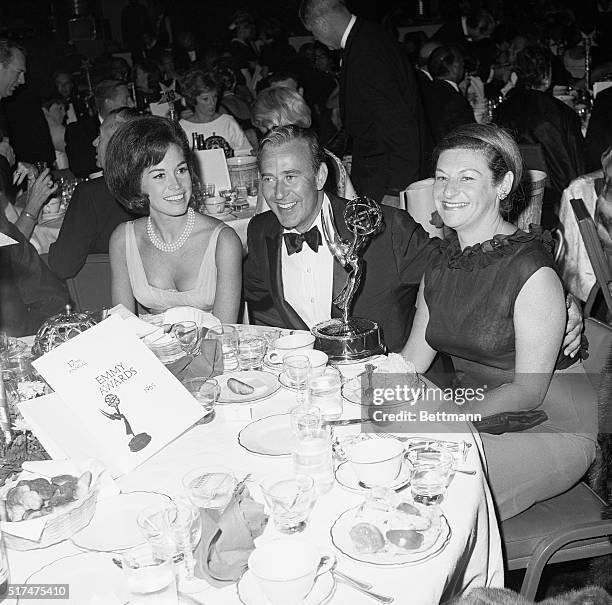 Mary Tyler Moore, Carl Reiner, and Mrs. Reiner at party following Emmy Awards, circa 1970.