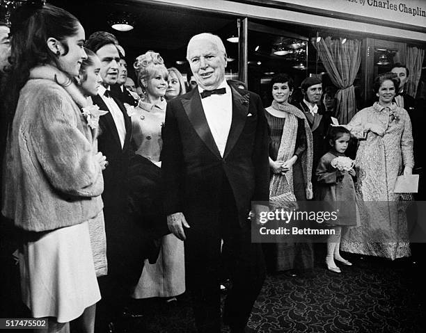 Chaplins at Premiere. London: Charlie Chaplin is accompanied by the women in his family at the premiere of his first movie in ten years, A Countess...