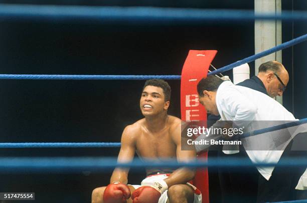 Ring action shown between world heavyweight champion Cassius Clay and challenger Karl Mildenberger during their title bout. Clay retained his title...