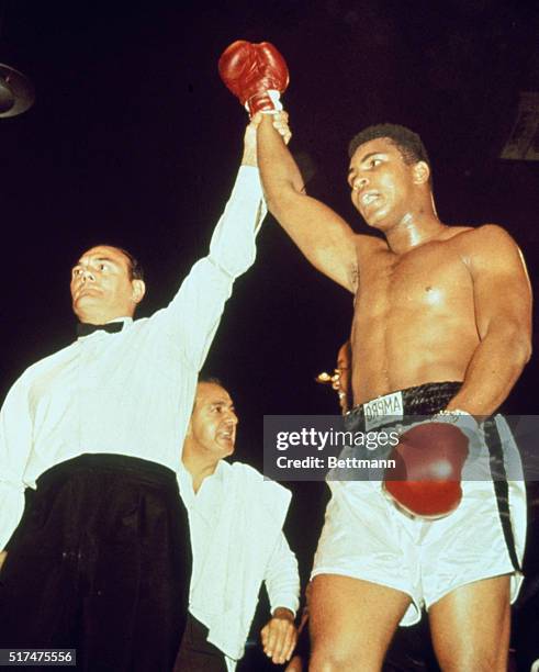 Cassius Clay following bout with British challenger Brian London. Clay retained heavyweight title after a knockout in the third round.