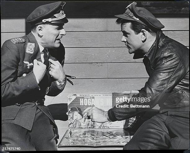 Werner Klemperner as Colonel Klink and Robert Crane as Colonel Hogan in Hogan's Heroes. TV series that ran from 1965-1971.