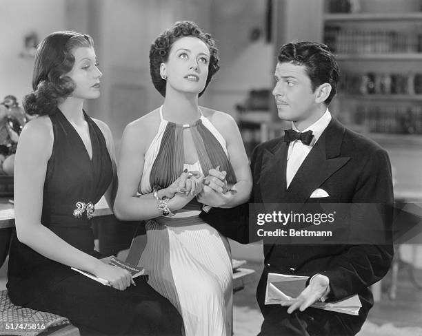 "Confess your love and find peace," says Joan Crawford, as Susan, throwing Rita Hayworth and John Caroll together despite the fact that Rita already...