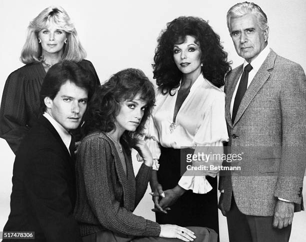 The original cast from the popular and long-running TV series Dynasty. Left to right , Linda Evans, Joan Collins, and John Forsythe. Seated, Pamela...